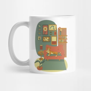 Little reader on the sofa Mug